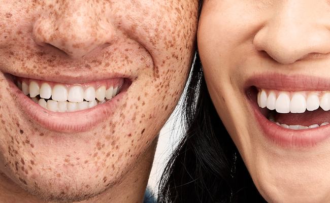 Patients smiling from austin dentist Breeze Dental