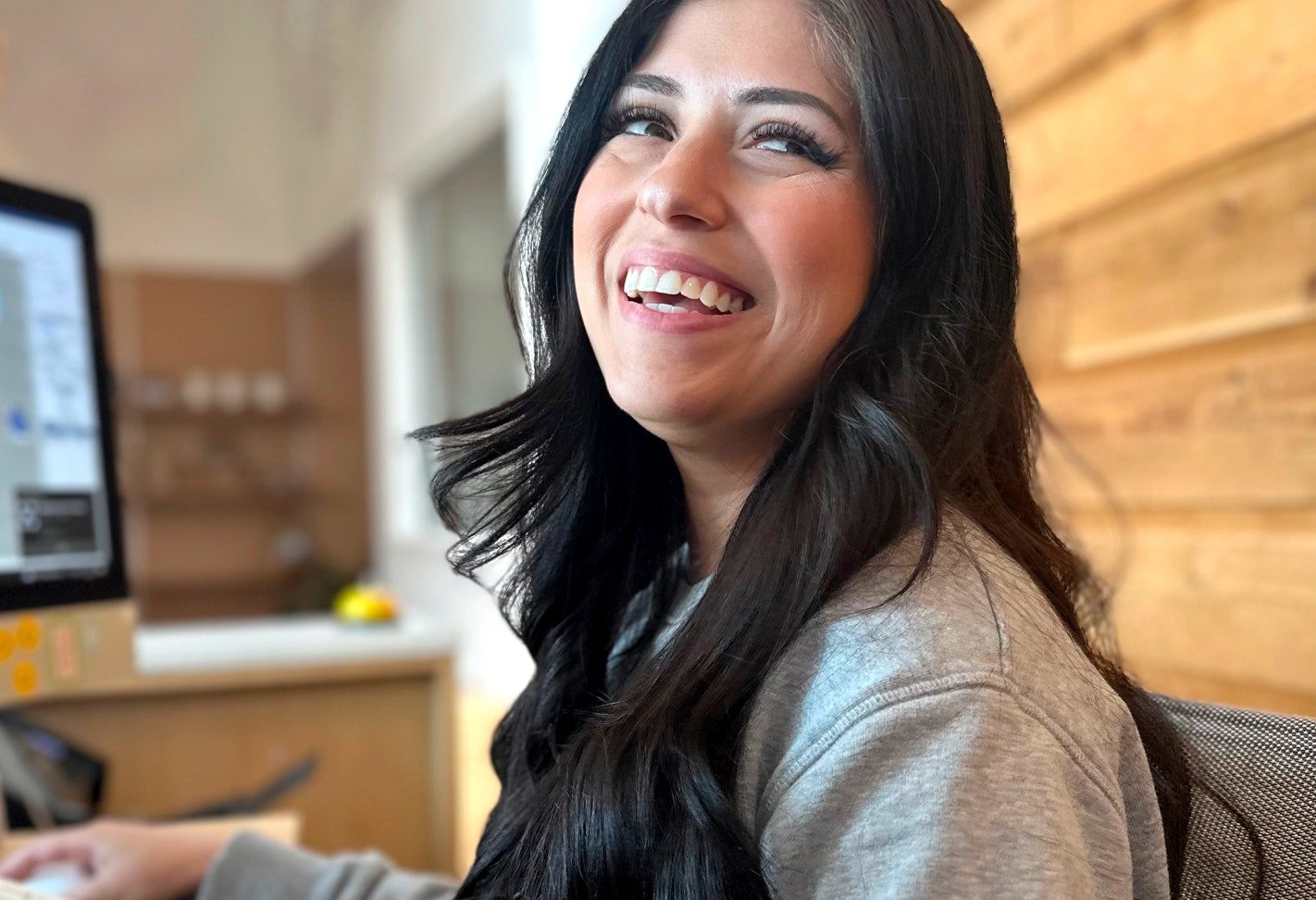 Laughing woman with straight teeth
